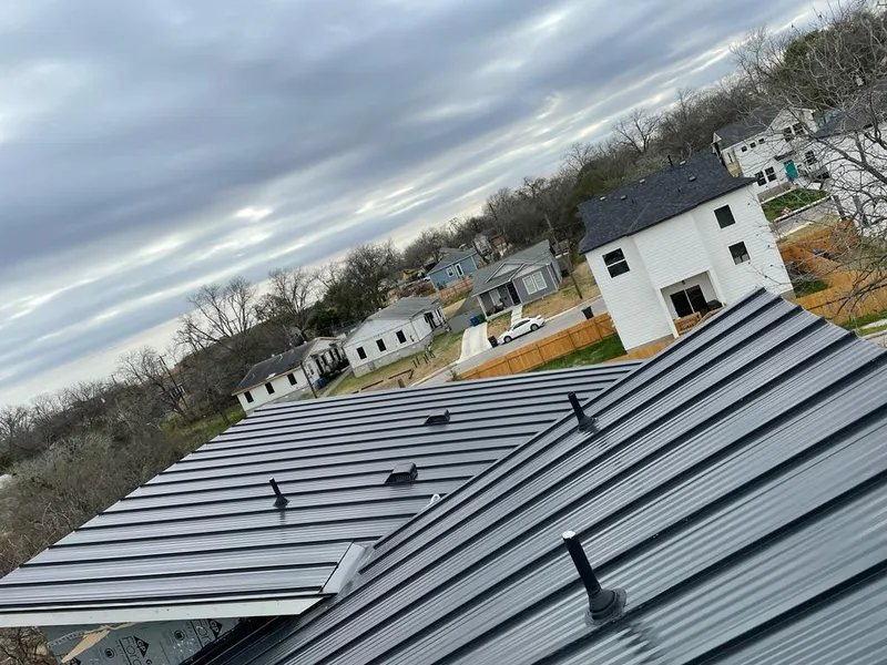 Standing seam metal roof panels with vents for Skylight Repair in St. Paul Park